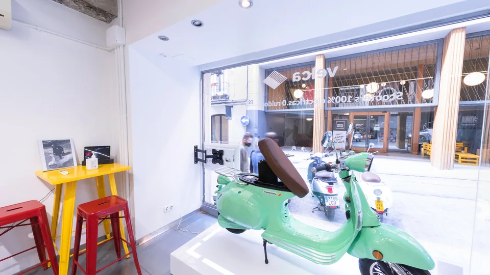 Electric scooters on display in a store photographed in 360°