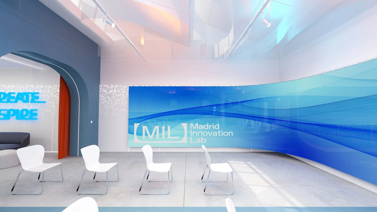 Hall at Madrid Innovation Lab with its curved LED screen and chairs